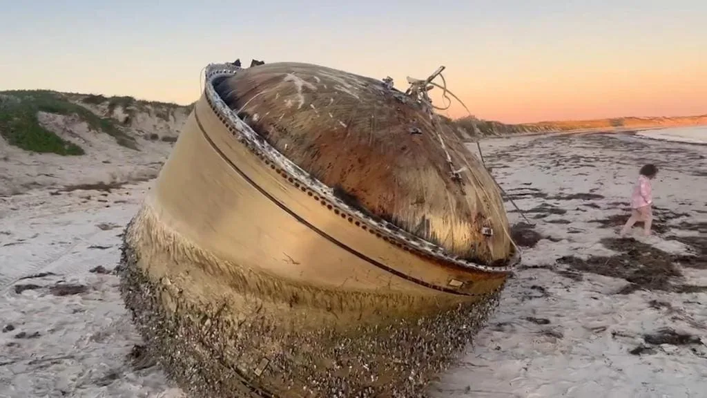 The military is tonight reviewing video of a large mystery object that has washed onto shore, at Green Head on the State's mid-west coast.