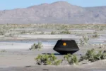 The return capsule containing a sample collected from the asteroid Bennu in October 2020 by NASA’s OSIRIS-REx spacecraft is seen shortly after touching down in the desert at the Department of Defense's Utah Test and Training Range in Dugway, Utah, U.S. September 24, 2023.  NASA/Keegan Barber/Handout via REUTERS
