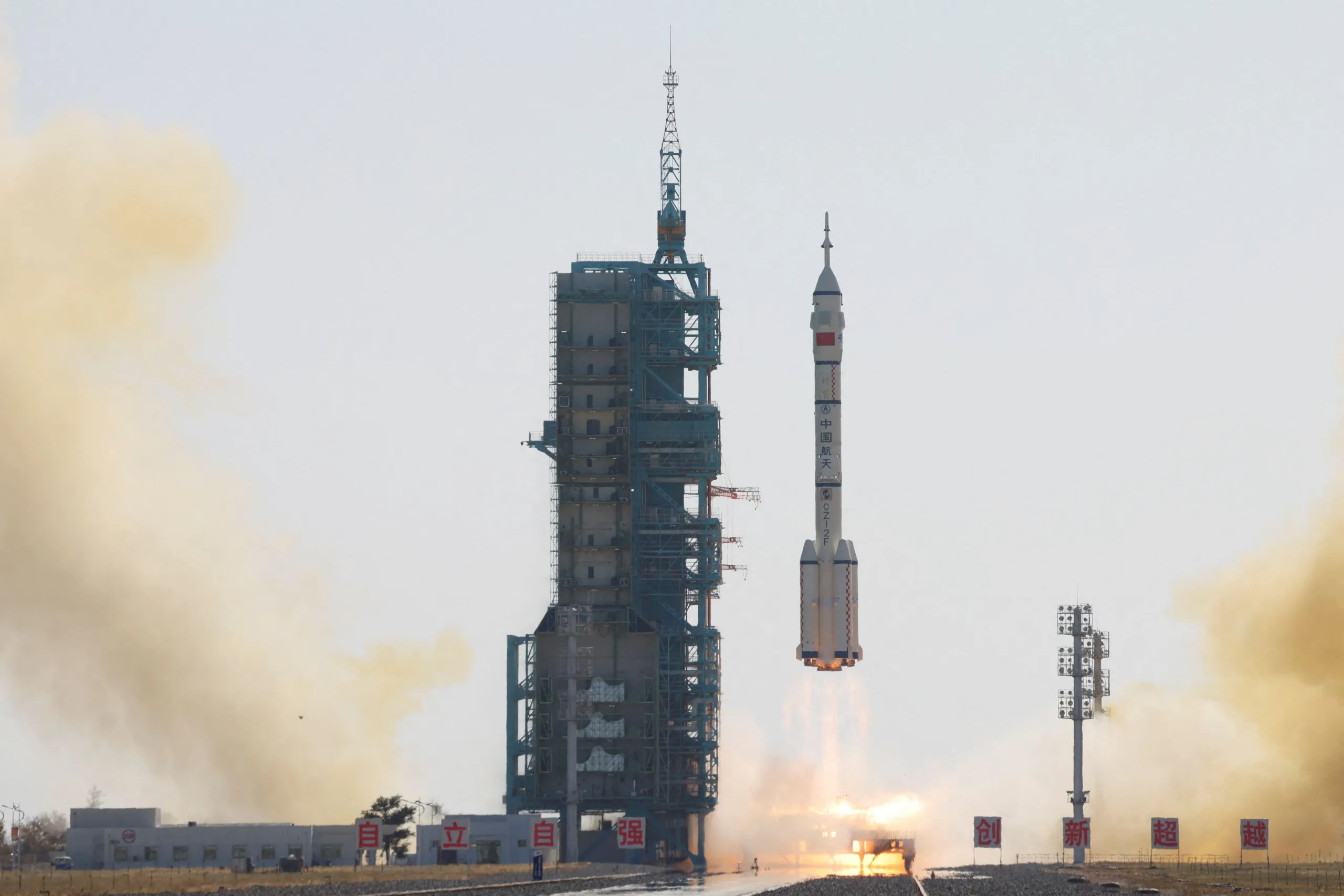 A Long March-2F carrier rocket, carrying the Shenzhou-17 spacecraft, takes off from Jiuquan Satellite Launch Center for a crewed mission to China's Tiangong space station, near Jiuquan, Gansu province, China October 26, 2023. China Daily via REUTERS