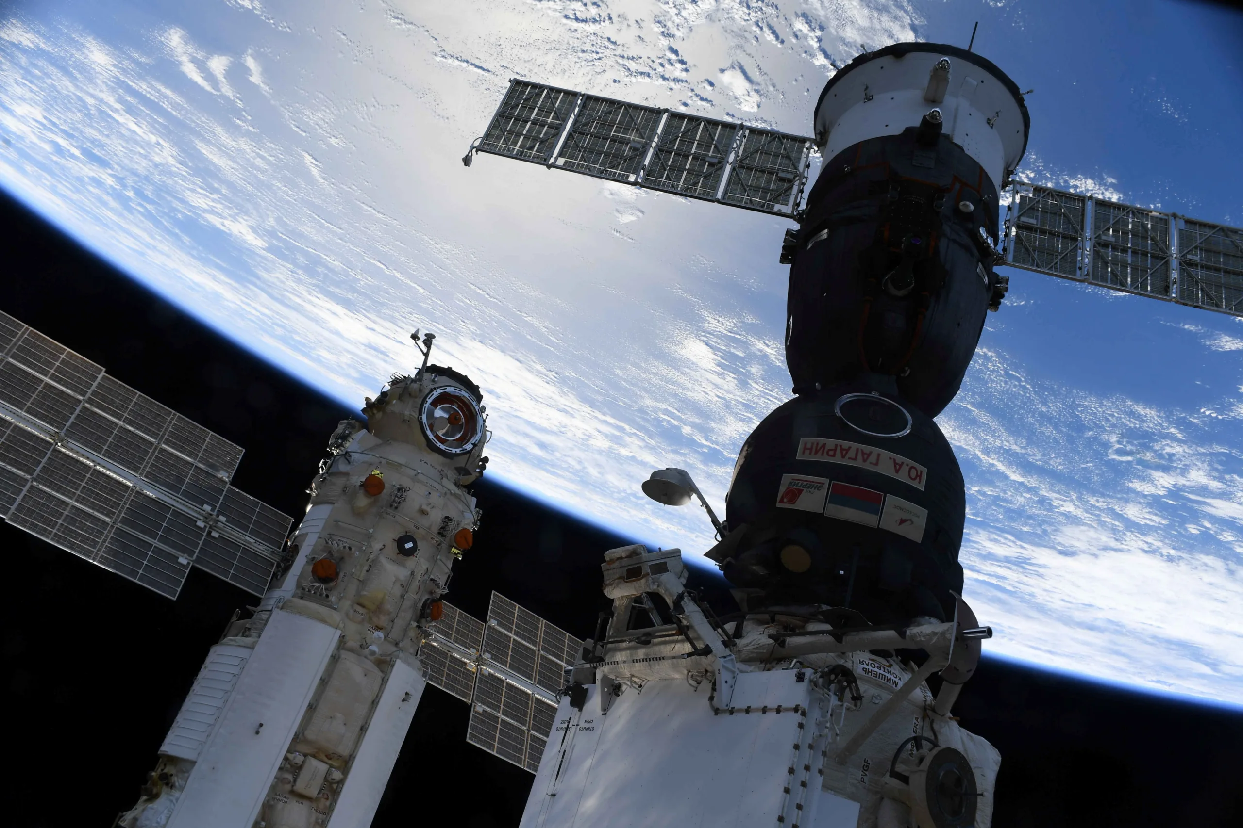 The Nauka (Science) Multipurpose Laboratory Module is seen docked to the International Space Station (ISS) next to next to Soyuz MS-18 spacecraft on July 29, 2021. Picture taken July 29, 2021. Oleg Novitskiy/Roscosmos/Handout via REUTERS