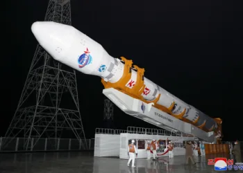 A rocket carrying a spy satellite Malligyong-1 is prepared to be launched, as North Korean government claims, in a location given as North Gyeongsang Province, North Korea in this handout picture obtained by Reuters on November 21, 2023.  KCNA via REUTERS