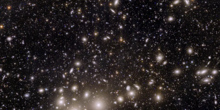 Galaxies belonging to the Perseus Cluster and others further away, captured by Euclid telescope, designed and built by European Space Agency (ESA) to explore dark matter and dark energy which are thought to make up 95% of the universe, are seen in this undated handout image. European Space Agency/Handout via REUTERS