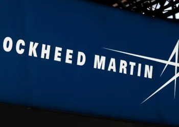 This photograph taken on June 13, 2022, shows the logo from US defence manufacturer Lockheed Martin on display at the Eurosatory international land and airland defence and security trade fair, in Villepinte, a northern suburb of Paris. (Photo by EMMANUEL DUNAND / AFP) (Photo by EMMANUEL DUNAND/AFP via Getty Images)