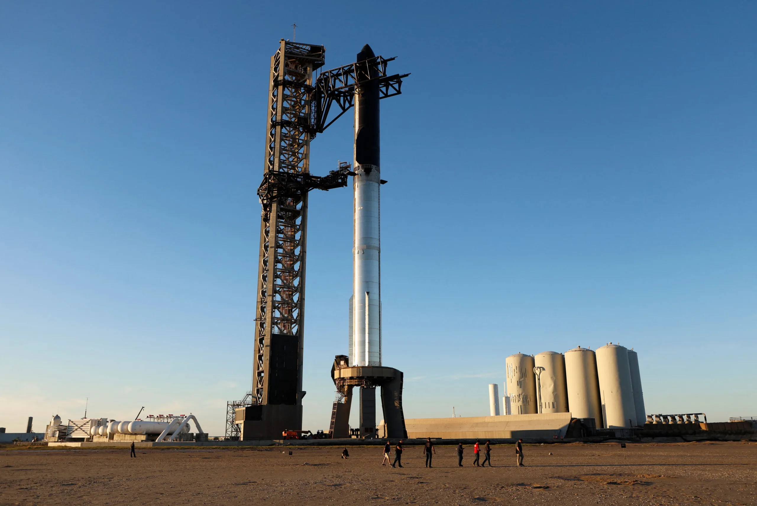 SpaceX's next-generation Starship spacecraft atop its powerful Super Heavy rocket is prepared for launch from the company's Boca Chica launchpad on an uncrewed test flight, near Brownsville, Texas, U.S., November 15, 2023. REUTERS/Joe Skipper
