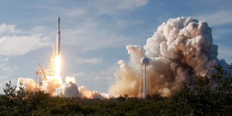 A SpaceX Falcon Heavy rocket lifts off from historic launch pad 39-A at the Kennedy Space Center in Cape Canaveral, Florida, U.S., February 6, 2018. REUTERS/Thom Baur/File Photo