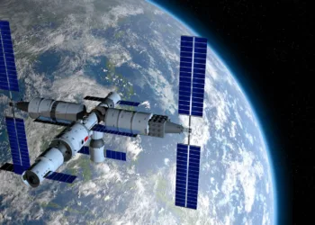 View of TIANGONG 3 - Chinese space station orbiting the planet Earth on black space with stars background. 3D Illustration