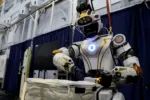 NASA's humanoid robot Valkyrie opens a bag at the Johnson Space Center in Houston, Texas, U.S., November 16, 2023. REUTERS/Evan Garcia