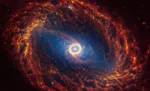 Spiral galaxy NGC 1512, located 30 million light-years away from Earth, is seen in an undated image from the James Webb Space Telescope. NASA, ESA, CSA, STScI, Janice Lee (STScI), Thomas Williams (Oxford), and the PHANGS team/Handout via REUTERS