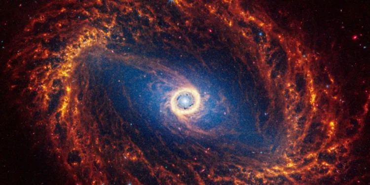 Spiral galaxy NGC 1512, located 30 million light-years away from Earth, is seen in an undated image from the James Webb Space Telescope. NASA, ESA, CSA, STScI, Janice Lee (STScI), Thomas Williams (Oxford), and the PHANGS team/Handout via REUTERS