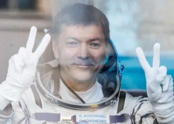 FILE PHOTO: Roscosmos cosmonaut Oleg Kononenko reacts in the bus just before the departure to the launchpad at the Baikonur Cosmodrome, Kazakhstan September 15, 2023. REUTERS/Maxim Shemetov/Pool/File Photo
