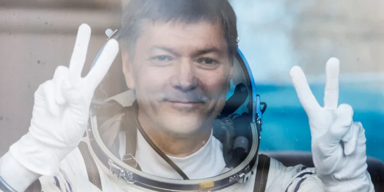 FILE PHOTO: Roscosmos cosmonaut Oleg Kononenko reacts in the bus just before the departure to the launchpad at the Baikonur Cosmodrome, Kazakhstan September 15, 2023. REUTERS/Maxim Shemetov/Pool/File Photo