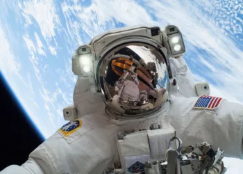 FILE PHOTO: An astronaut is shown in this handout photo provided by NASA participating in a spacewalk that took place on December 24, 2013, released on December 27, 2013. REUTERS/NASA/Handout via Reuters/File Photo
