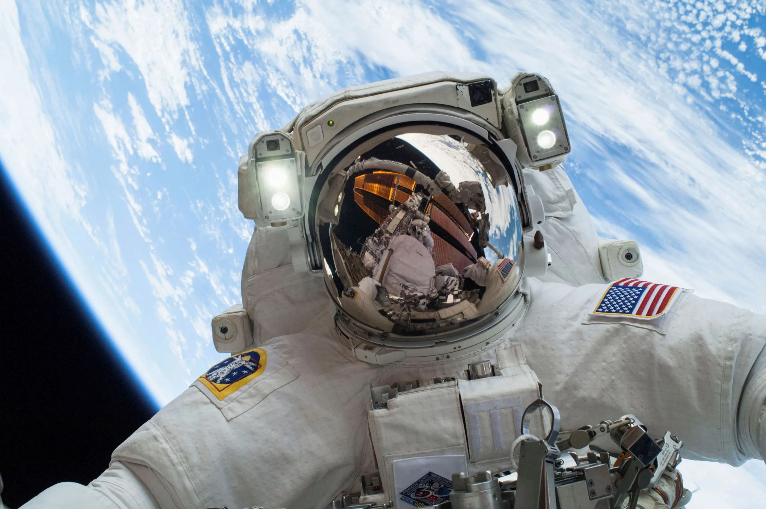 FILE PHOTO: An astronaut is shown in this handout photo provided by NASA participating in a spacewalk that took place on December 24, 2013, released on December 27, 2013. REUTERS/NASA/Handout via Reuters/File Photo