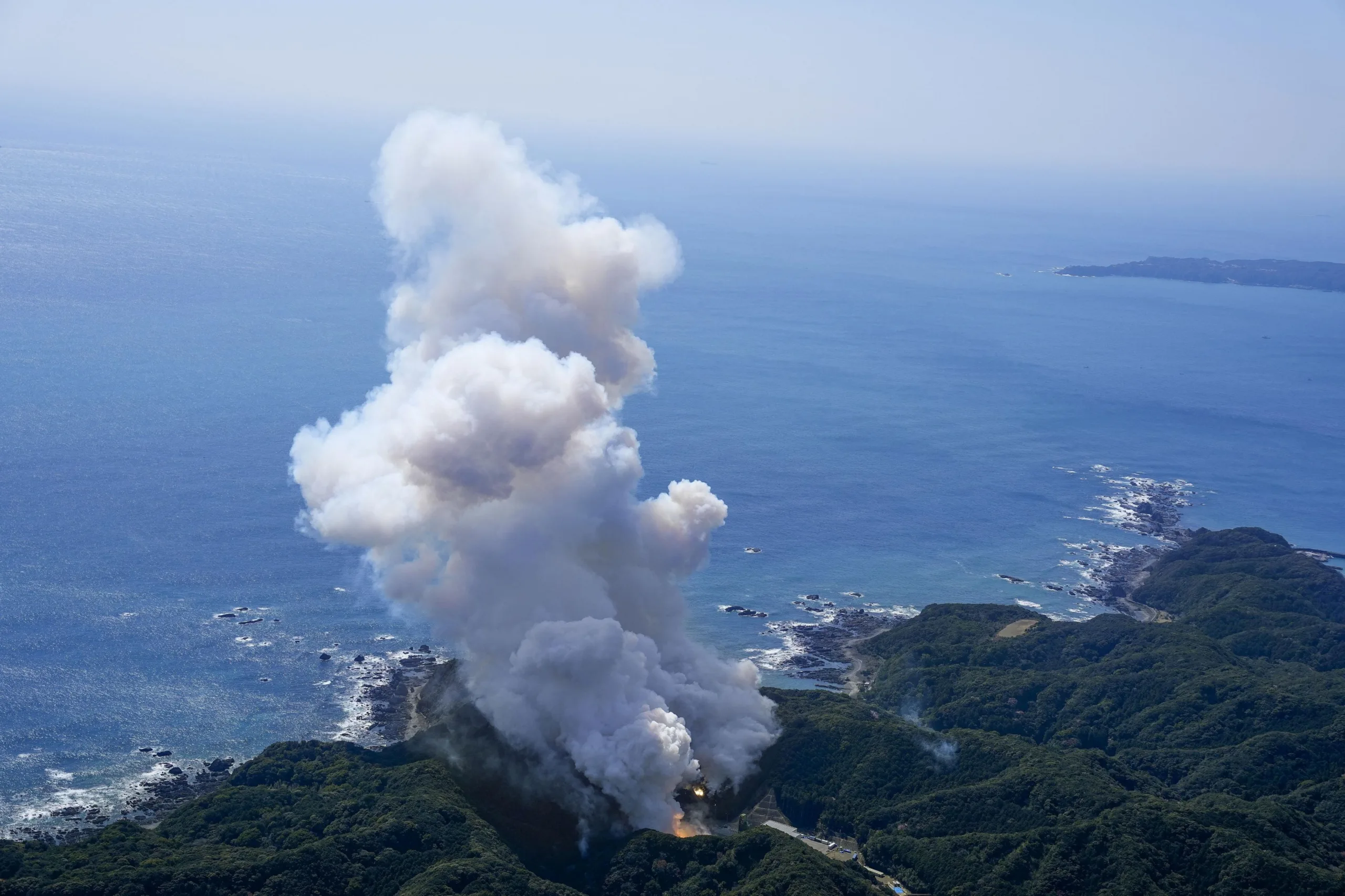 Smoke rises after Japan's Space One's small, solid-fueled Kairos rocket exploded shortly after its inaugural launch at Space One's launching pad on the tip of Kii peninsula in Kushimoto town, Wakayama prefecture, Japan March 13, 2024, in this photo taken by Kyodo. Mandatory credit Kyodo via REUTERS