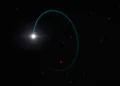 An artist's impression shows the orbits of the most massive stellar black hole in our galaxy, dubbed Gaia BH3, and a companion star, in this handout image obtained by Reuters on April 16, 2024. European Southern Observatory/L. Calcada/Handout via REUTERS