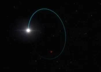 An artist's impression shows the orbits of the most massive stellar black hole in our galaxy, dubbed Gaia BH3, and a companion star, in this handout image obtained by Reuters on April 16, 2024. European Southern Observatory/L. Calcada/Handout via REUTERS