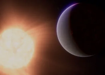 An artist's concept shows the exoplanet 55 Cancri e, also called Janssen, a so-called super-Earth, a rocky planet significantly larger than Earth but smaller than Neptune, along with the star it orbits in this undated illustration released by NASA. NASA, ESA, CSA, Ralf Crawford (STScI)/Handout via REUTERS.