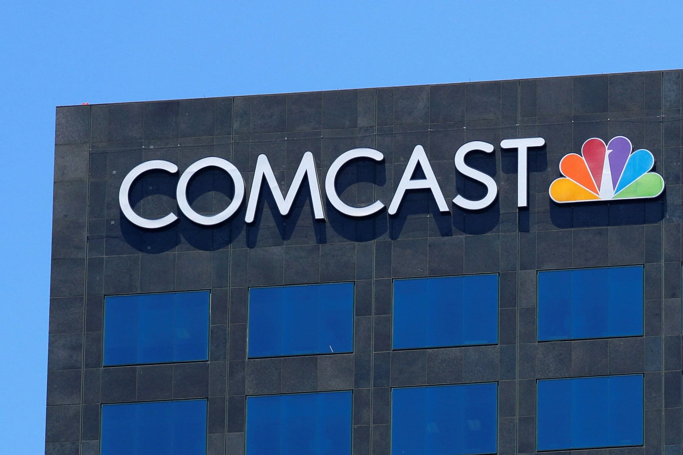 The Comcast NBC logo is shown on a building in Los Angeles, California, U.S. June 13, 2018.        REUTERS/Mike Blake