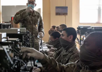 Soldiers in advanced individual training on Fort Sill learn about the single channel ground and airborne radio system on Fort Sill, Okla., April 21, 2020.  Students and instructors are required to wear face masks.
