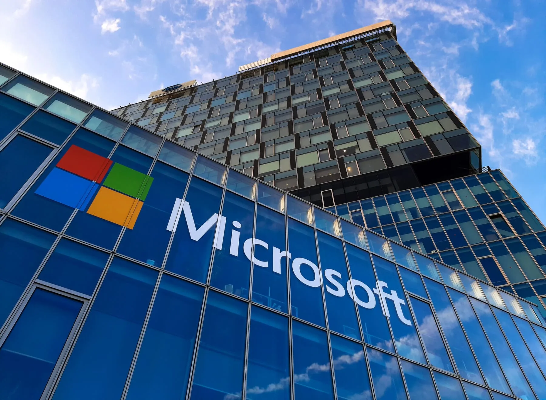 Bucharest, Romania - November 27, 2019: View of Microsoft Romania headquarters in City Gate Towers situated in Free Press Square, in Bucharest, Romania.