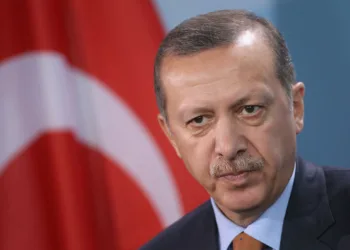 BERLIN, GERMANY - NOVEMBER 02:  Turkish Prime Minister Recep Tayyip Erdogan speaks to the media following talks with German Chancellor Angela Merkel at the Chancellery on November 2, 2011 in Berlin, Germany. Earlier in the day the two leaders attended a celebration to mark 50 years of Turkish immigration to Germany. On October 30, 1961 Turkey and what was then West Germany signed an agreement that paved the way for the migration of Turkish "guest workers" to Germany. Germany in the early 1960s, which in many ways was still recovering from the devastation of World War II, required foreign labour to fill its industrial workforce, and the influx of immigrants from Turkey, Italy, Greece and other south European countries made Germany?s "economic miracle" possible. Today large numbers of Germans with Turkish roots are an integral part of German society, though integration and assimilation remain a contentious issue, especially for more recent Turkish immigrants.  (Photo by Sean Gallup/Getty Images)