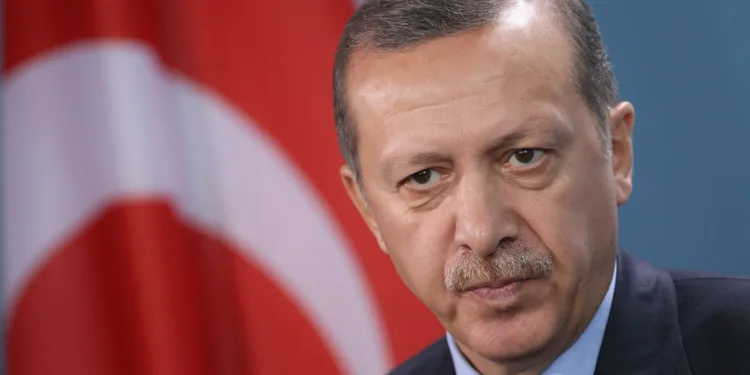 BERLIN, GERMANY - NOVEMBER 02: Turkish Prime Minister Recep Tayyip Erdogan speaks to the media following talks with German Chancellor Angela Merkel at the Chancellery on November 2, 2011 in Berlin, Germany. Earlier in the day the two leaders attended a celebration to mark 50 years of Turkish immigration to Germany. On October 30, 1961 Turkey and what was then West Germany signed an agreement that paved the way for the migration of Turkish "guest workers" to Germany. Germany in the early 1960s, which in many ways was still recovering from the devastation of World War II, required foreign labour to fill its industrial workforce, and the influx of immigrants from Turkey, Italy, Greece and other south European countries made Germany?s "economic miracle" possible. Today large numbers of Germans with Turkish roots are an integral part of German society, though integration and assimilation remain a contentious issue, especially for more recent Turkish immigrants. (Photo by Sean Gallup/Getty Images)