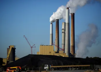 A coal mound stands outside a Kentucky Utilities Co. station.