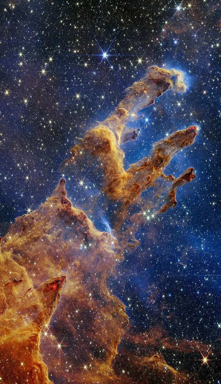 Imagen exuberante y sumamente detallada del JWST: los icónicos Pilares de la Creación, donde se forman nuevas estrellas dentro de densas nubes de gas y polvo