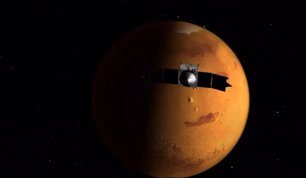 Esquema de un orbitador de la NASA alredoedor de Marte.