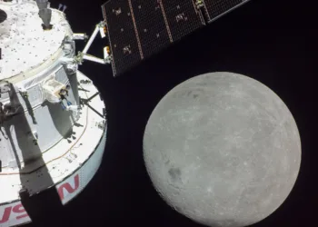 art001e000268 (Nov. 21, 2022) A portion of the far side of the Moon looms large just beyond the Orion spacecraft in this image taken on the sixth day of the Artemis I mission by a camera on the tip of one of Orion’s solar arrays. The spacecraft entered the lunar sphere of influence Sunday, Nov. 20, making the Moon, instead of Earth, the main gravitational force acting on the spacecraft. On Monday,  Nov. 21, it came within 80 miles of the lunar surface, the closest approach of the uncrewed Artemis I mission, before moving into a distant retrograde orbit around the Moon.