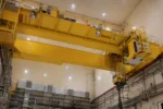 El reactor nuclear argentino RA-10 activa sus puentes grúa y avanza hacia su puesta en marcha.