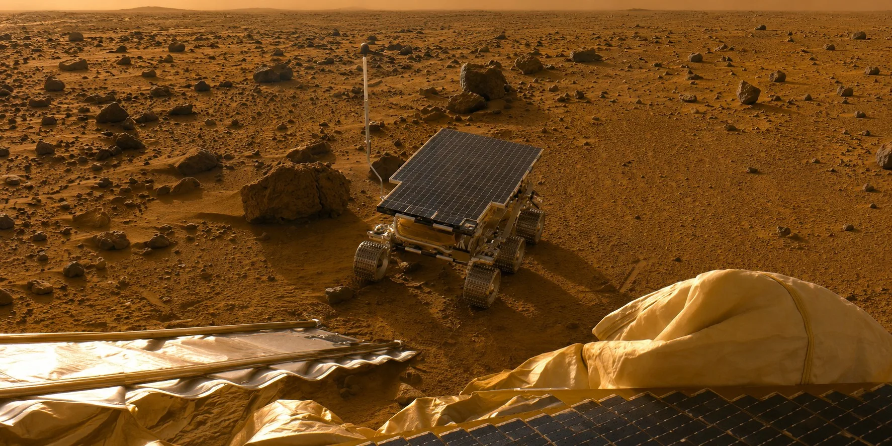 Mosaico de ocho imágenes del rover Sojourner recién desplegado sobre la superficie marciana.